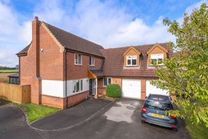 Main elevation- click for photo gallery